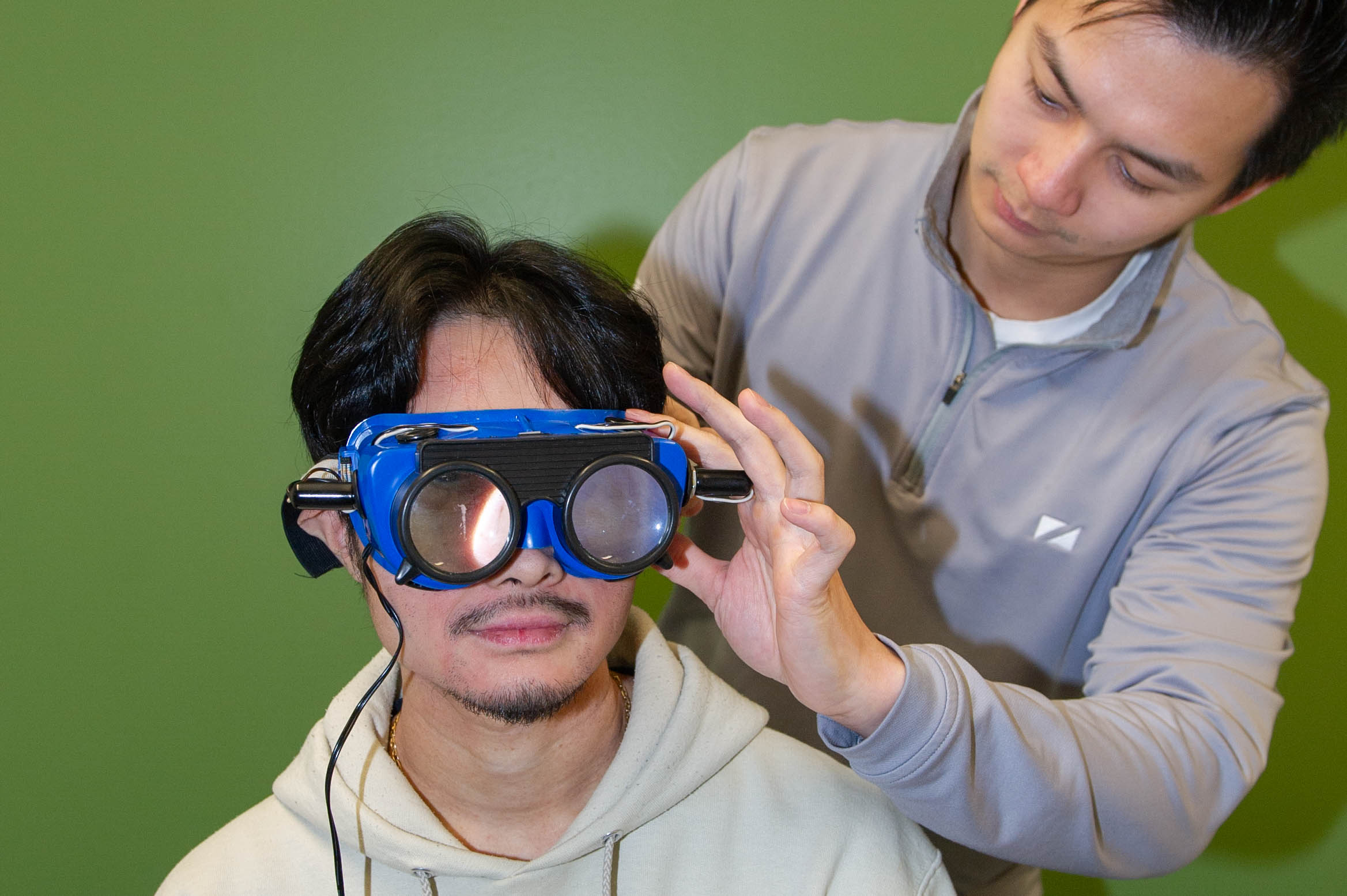 A male client receives vestibular therapy at Strive Fitness and Therapy in Winnipeg.